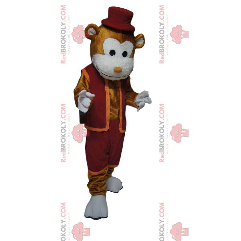 Wesoła brązowa małpa maskotka z bordowym strojem i kapeluszem
