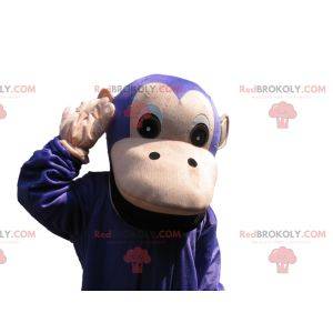 Mascotte de singe violet et marron. Costume de singe