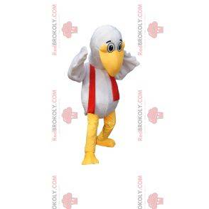 Biały ptak maskotka z zabawnym dziobem i czerwonym szalikiem