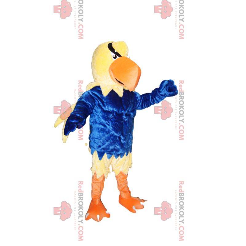 Yellow eagle maskot med blå jersey