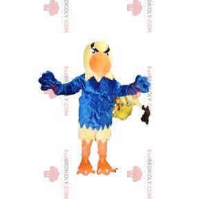 Yellow eagle mascot with a blue jersey