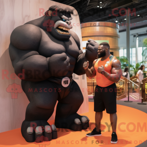 Sort Strongman maskot...