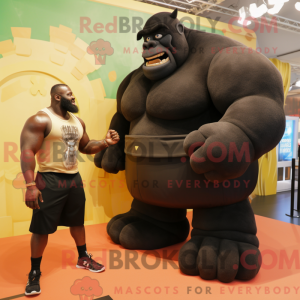 Sort Strongman maskot...