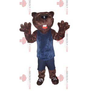 Mascotte dell'orso bruno in abiti sportivi blu