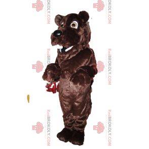 Bardzo szczęśliwa maskotka niedźwiedzia brunatnego z ładnym czarnym pyskiem