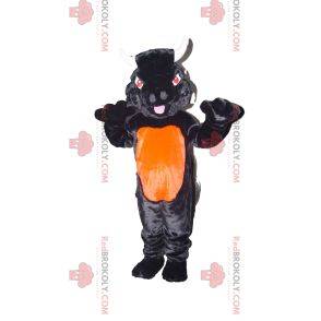Schwarzes und orange Bullmaskottchen mit roten Augen