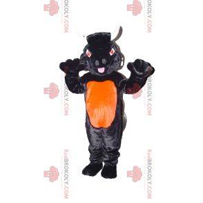 Schwarzes und orange Bullmaskottchen mit roten Augen