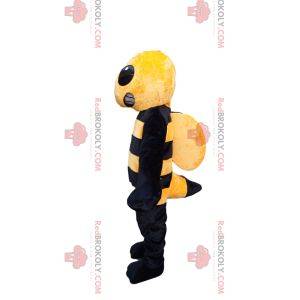 Aggressive yellow and black wasp mascot. Wasp costume