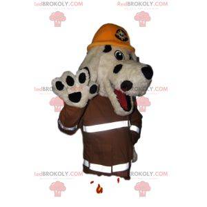 Mascotte de chien blanc et noir avec une tenue de pompier