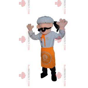 Mascotte de Chef avec une toque blanche et un tablier orange.