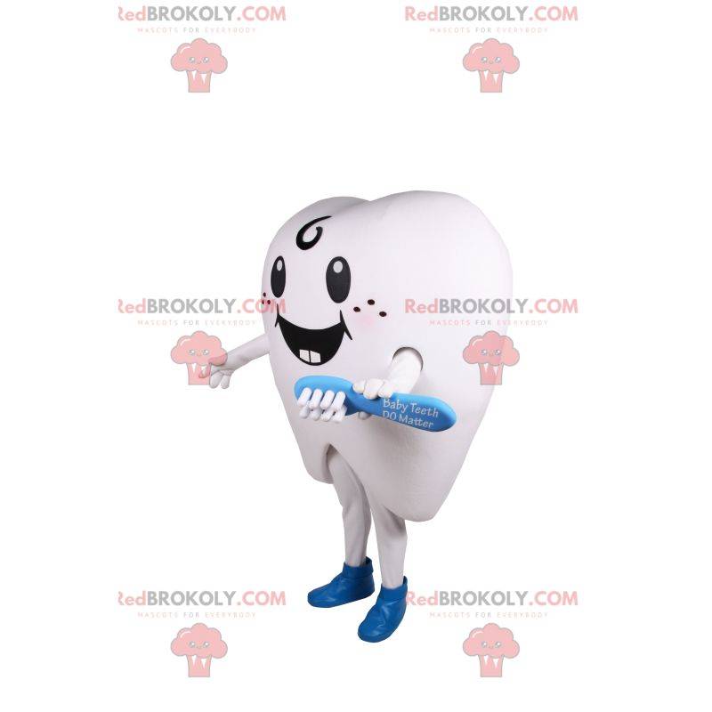 Mascote de dente branco sorridente e escova de dente azul Mascote de dente branco sorridente e escova de dente azul