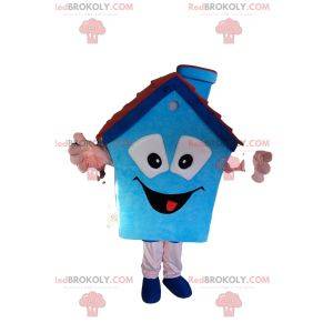 Blue house mascot with a small fireplace