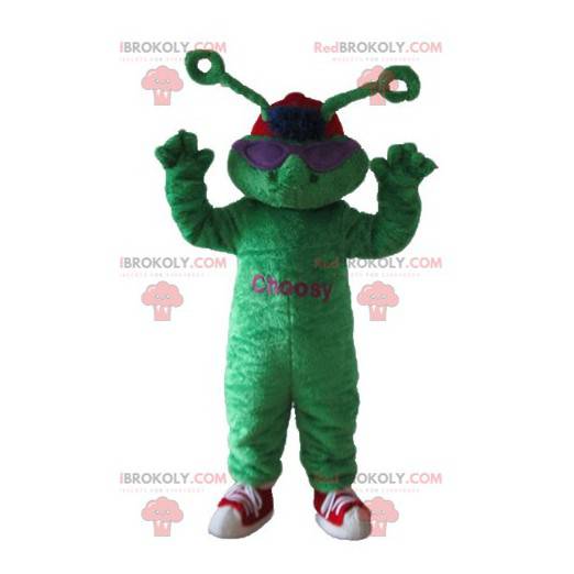 Green frog mascot of extraterrestrial with antennas -