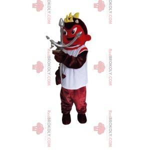 Mascotte de diablotin rouge avec un maillot blanc