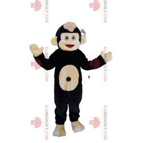 Mascotte de Ouistiti noir et beige très joyeux. Costume de ouistiti