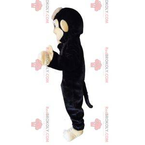 Very happy black and beige marmoset mascot. Marmoset costume
