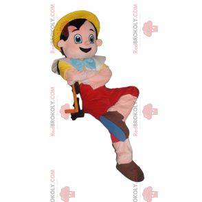 Mascot Pinocchio med sin gule hat. Pinocchio kostume
