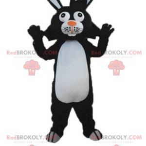 Mascote coelho preto e branco com orelhas grandes -