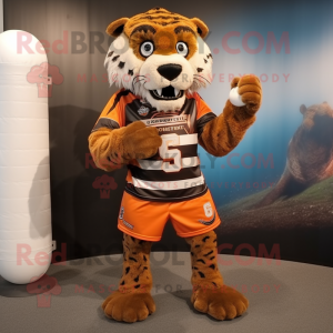 Rust Saber-Toothed Tiger mascot costume character dressed with a Rugby Shirt and Scarf clips