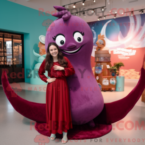 Maroon Narwhal maskot...