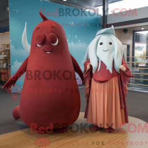 Maroon Narwhal maskot...