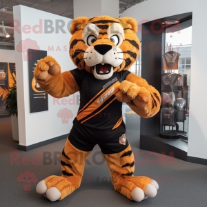 Rust Saber-Toothed Tiger mascot costume character dressed with a Rugby Shirt and Scarf clips