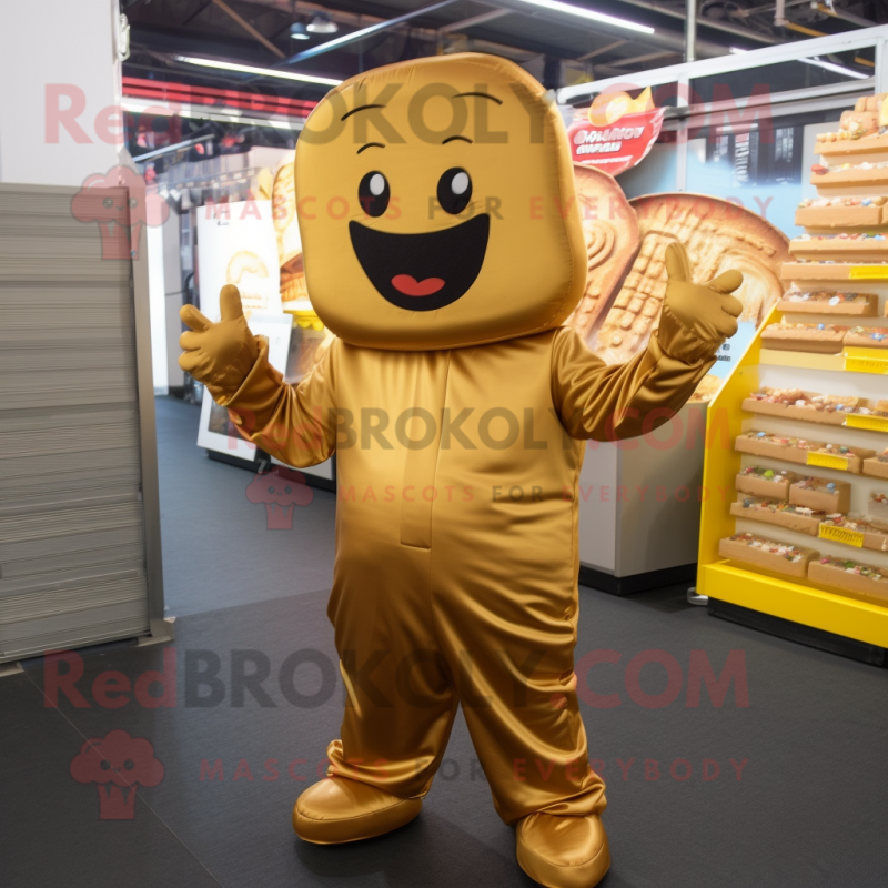 Gold Chocolate Bar mascot costume character dressed with a Jumpsuit and Beanies