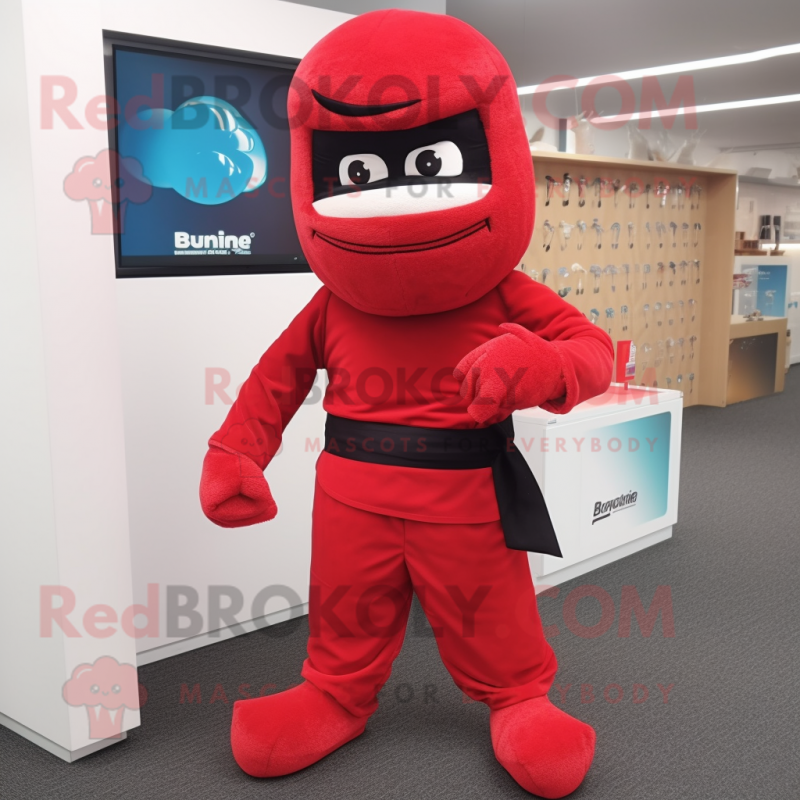 Red Ninja mascot costume character dressed with a Henley Shirt and Clutch bags Red Ninja mascot costume character dressed with a Henley Shirt and Clutch bags