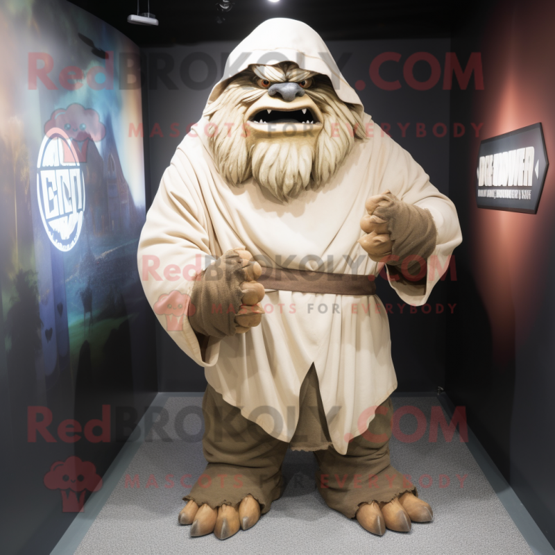 Tan Ogre mascot costume character dressed with a Hoodie and Shawl pins Tan Ogre mascot costume character dressed with a Hoodie and Shawl pins