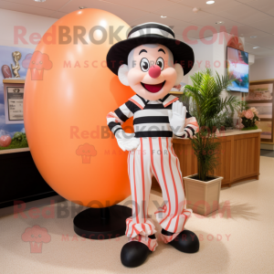 Peach Mime mascot costume character dressed with a Capri Pants and Ties