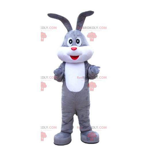 Mascotte coniglio grigio e bianco dolce gioviale e carino -