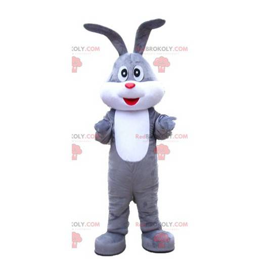 Mascotte de lapin gris et blanc doux jovial et mignon -