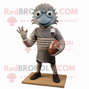 Gray Trilobite mascot costume character dressed with a Rugby Shirt and Bracelets