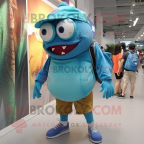 Cyan Piranha mascot costume character dressed with a Shorts and Eyeglasses