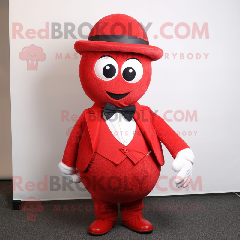 Red Golf Ball mascot costume character dressed with a Coat and Bow ties Red Golf Ball mascot costume character dressed with a Coat and Bow ties