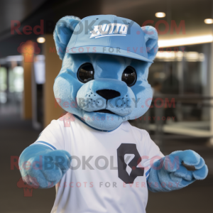 Sky Blue Puma mascot costume character dressed with a Graphic Tee and Caps