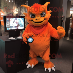 Orange Gargoyle mascot costume character dressed with a Long Sleeve Tee and Smartwatches