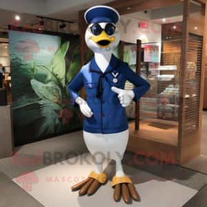 Navy Goose mascot costume character dressed with a Swimwear and Eyeglasses