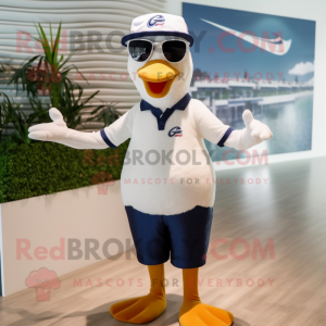 Navy Goose mascot costume character dressed with a Swimwear and Eyeglasses