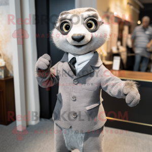 Gray Meerkat mascot costume character dressed with a Henley Shirt and Tie pins