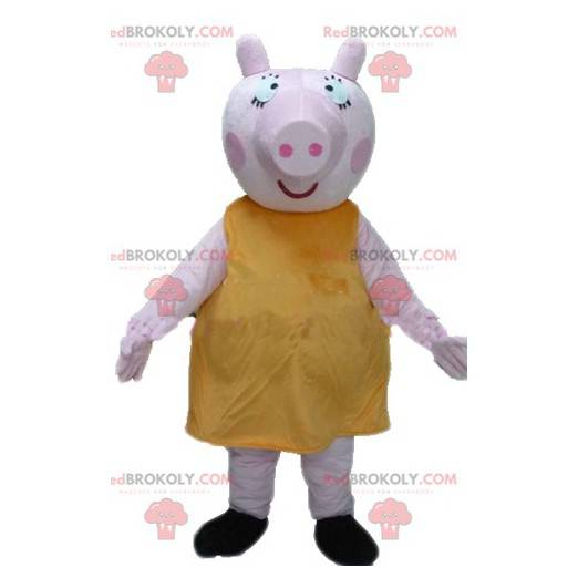 Groot roze varken mascotte met een dikke en grappige gele jurk