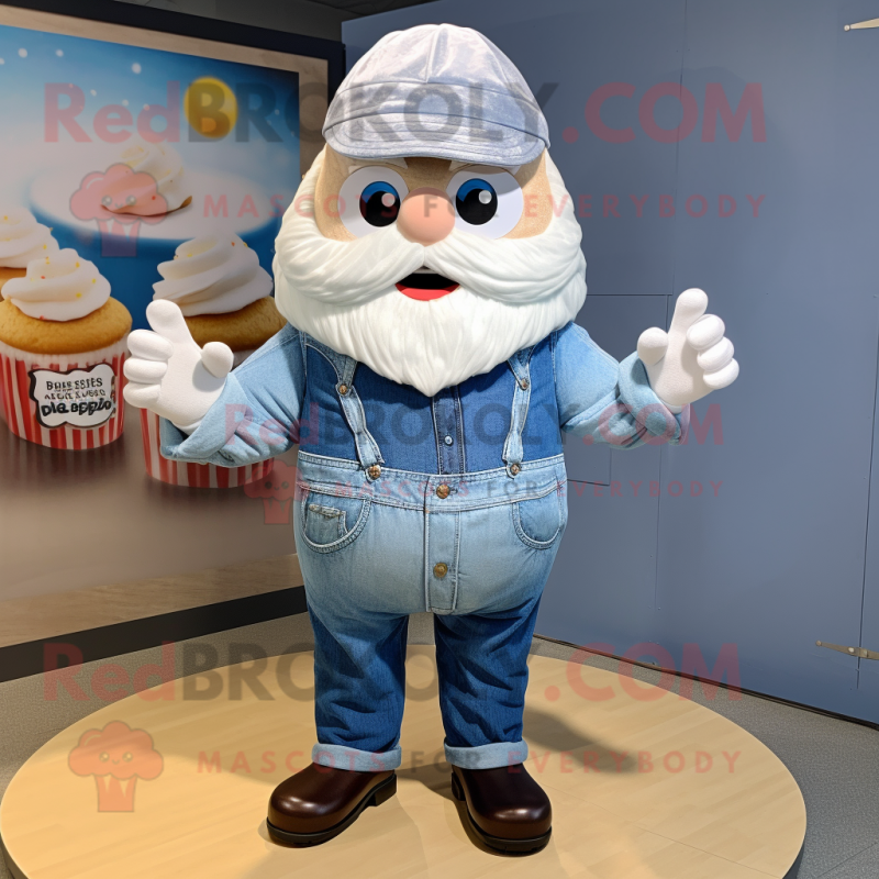 Cream Cupcake mascot costume character dressed with a Denim Shirt and Rings Cream Cupcake mascot costume character dressed with a Denim Shirt and Rings