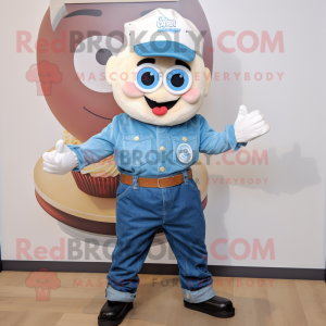 Cream Cupcake mascot costume character dressed with a Denim Shirt and Rings