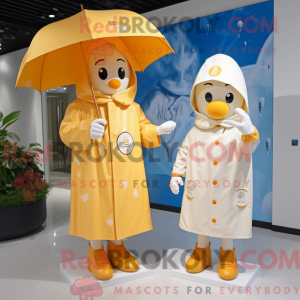 Cream aprikos maskot drakt...