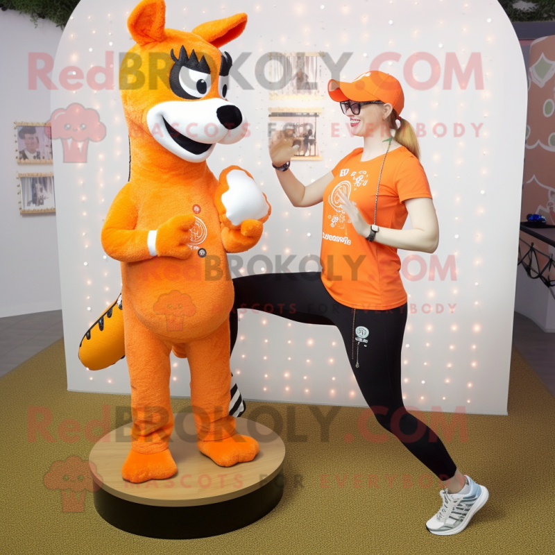 Orange Mare mascot costume character dressed with a Yoga Pants and Necklaces Orange Mare mascot costume character dressed with a Yoga Pants and Necklaces