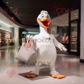 White Swan mascot costume character dressed with a V-Neck Tee and Tote bags