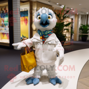 White Macaw mascot costume character dressed with a Sweater and Clutch bags