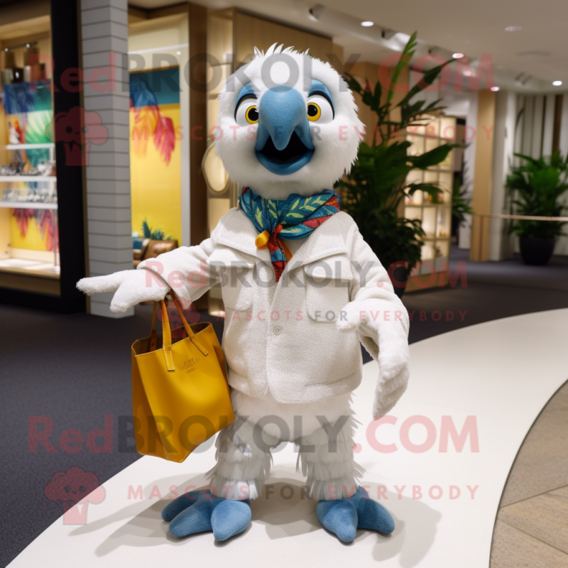 White Macaw mascot costume character dressed with a Sweater and Clutch bags White Macaw mascot costume character dressed with a Sweater and Clutch bags