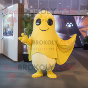 Yellow Stingray mascot costume character dressed with a Wrap Skirt and Gloves