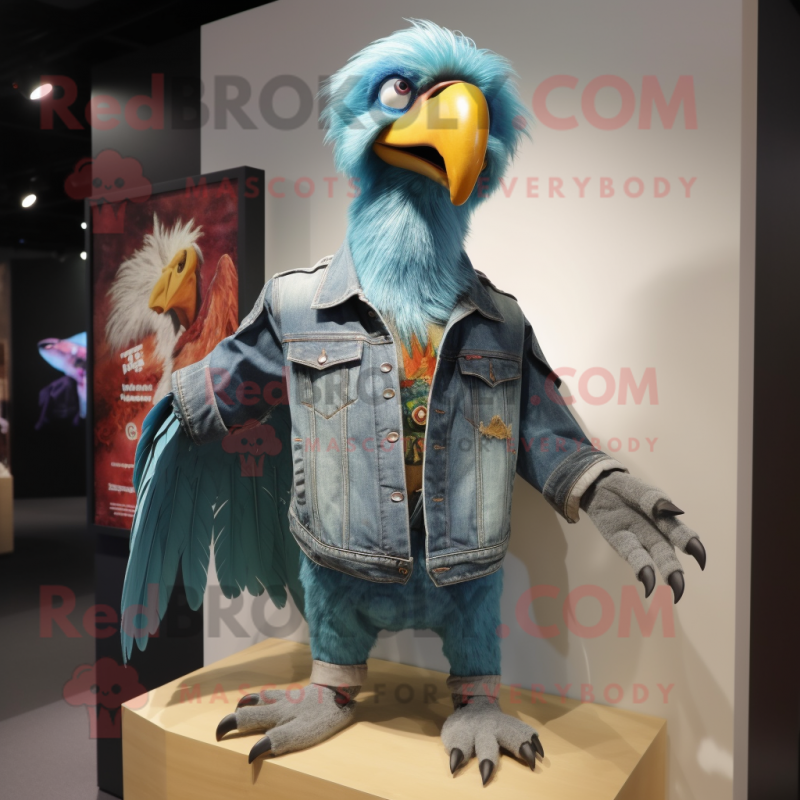 Turquoise Vulture mascot costume character dressed with a Denim Shirt and Brooches Turquoise Vulture mascot costume character dressed with a Denim Shirt and Brooches